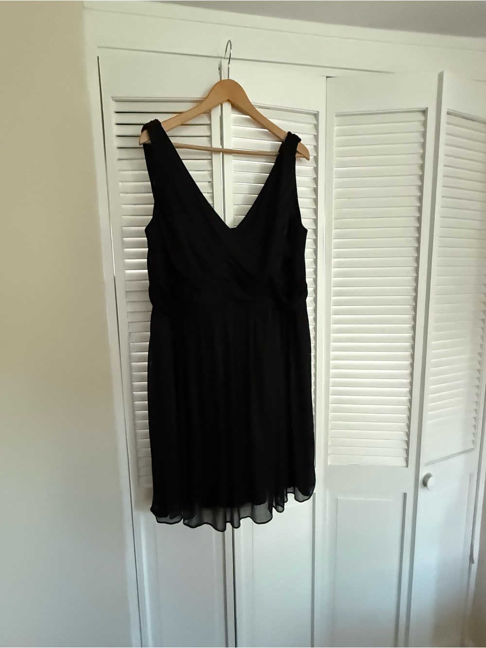 Davids Bridal Sleeveless Jersey Dress with Criss-Cross Waist 
STYLE# VC5107662